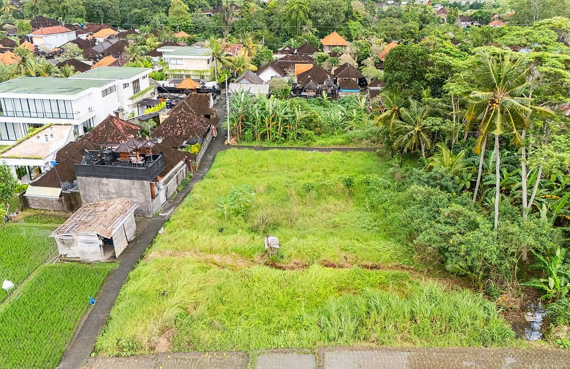 Aerial view of the plot with neighbouring villas to the west
